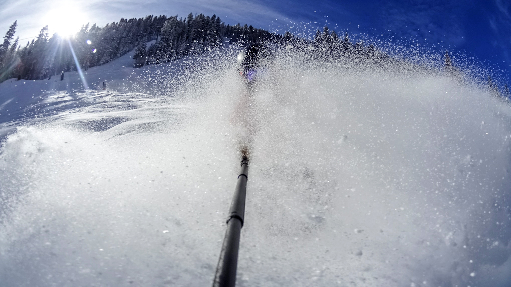 Will Brown on the Blizzard Peacemaker (somewhere in there), Taos Ski Valley
